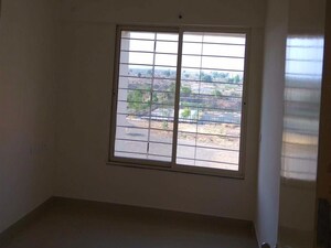 Room in 2 BHK Apartment at Mahindra Bloomdale, Mihan – for Sale