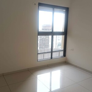 Room in 2.5 BHK Apartment at Chandak 34 Park Estate, Goregaon West – for Sale