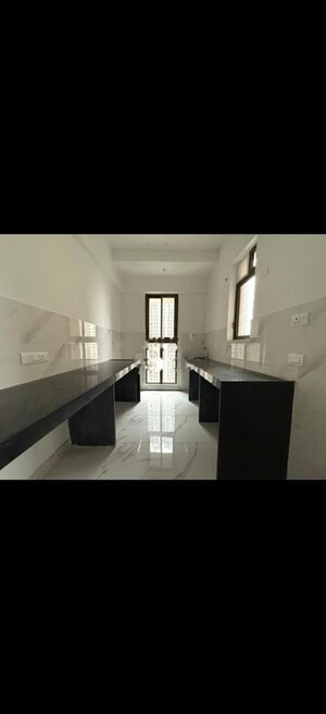 Kitchen in 2 BHK Apartment at Raymond Ten X Habitat, Pokhran Road No Two – for Rent