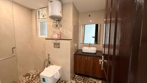 Bathroom in 4 BHK Apartment at 3C Lotus 300, Sector 107 – for Rent