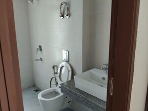 Bathroom in 2 BHK Apartment at Godrej Palm Retreat, Sector 150 – for Sale