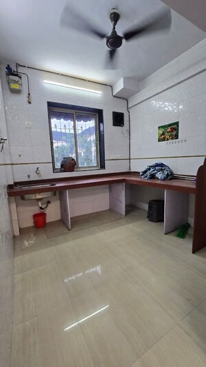 Kitchen in 2 BHK Apartment at Rameshwar Sadan CHS, Kamothe Sector 18 – for Sale