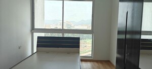 Master Bedroom in 2 BHK Apartment at Aurum Q Residences, Ghansoli – for Rent