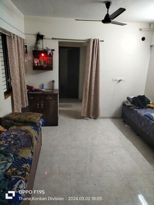 Living Room in 1 BHK Apartment at Lodha Palava Downtown, Dombivli East – for Rent