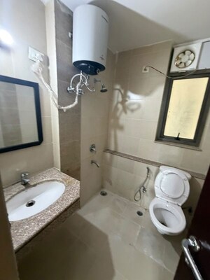 Bathroom in 2 BHK Apartment at Unitech Uniworld Gardens, Sector 47 – for Rent