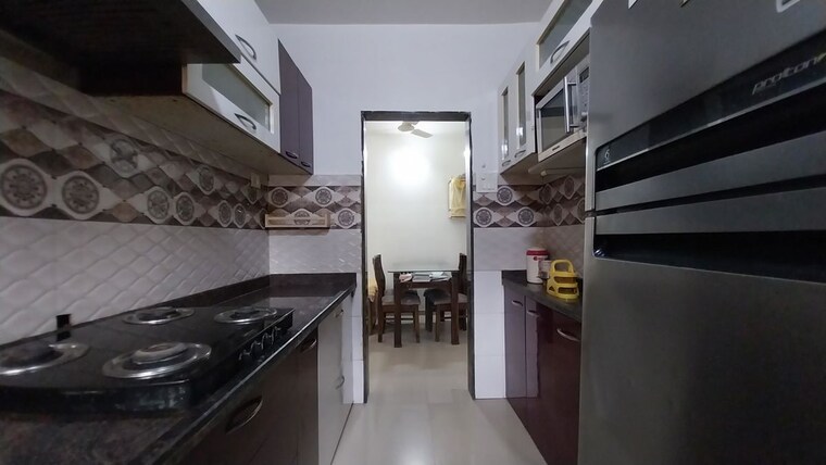 Kitchen, bhoomi-trivas-chs-ltd 2 Bedroom 1085 Sq.Ft. Apartment In Kharghar Navi Mumbai 10662504
