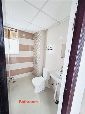 Bathroom in 2 BHK Apartment at Raj Nagar Extension – for Rent