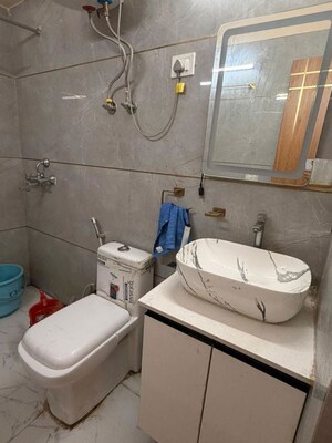 Bathroom in 2 BHK Apartment at Shree Vardhman Green Court, Sector 90 – for Rent