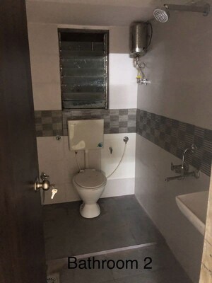 Bathroom in 2 BHK Apartment at Link Plaza, Andheri West – for Rent