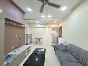 Living Room in 2 BHK Apartment at Rustomjee Azziano Wing E, Thane West – for Rent
