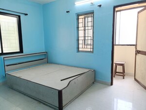 Bedroom in 2 BHK Apartment at Kasturba Housing Society, Vishrantwadi – for Rent