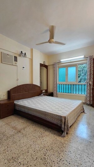 Bedroom in 1 BHK Apartment at Rizvi Palace, Bandra West – for Rent