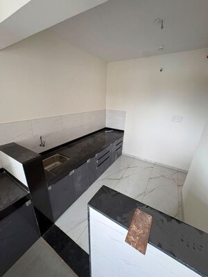 Kitchen in 2 BHK Apartment at K Raheja Sterling, Mohammadwadi – for Sale