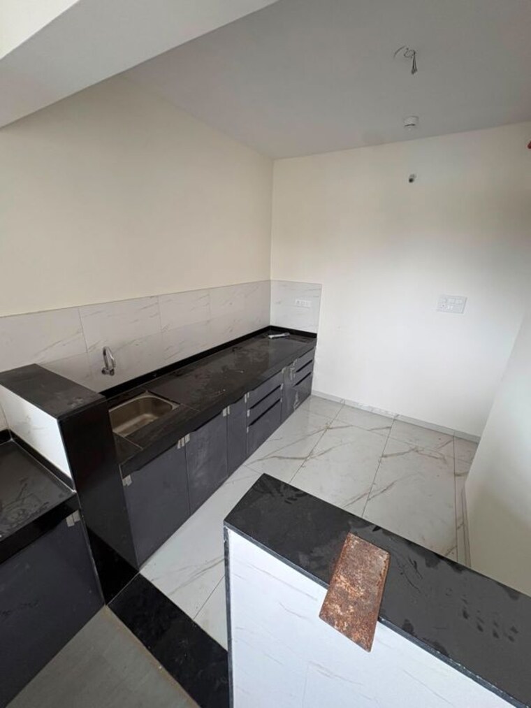 Kitchen, k-raheja-sterling 2 Bedroom 680 Sq.Ft. Apartment In Mohammadwadi Pune 10662839