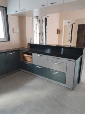 Kitchen in 4 BHK Apartment at Nirmiti Ragdari Apartments, Aundh – for Rent