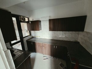 Kitchen in 2 BHK Apartment at RG Luxury Homes, Sector 16b Greater Noida – for Sale