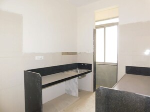 Kitchen in 2 BHK Apartment at DGS Sheetal Anupam, Malad West – for Rent