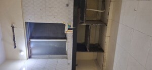 Kitchen in 1 BHK Apartment at Giriraj Gokulesh Dham, Ghansoli – for Rent