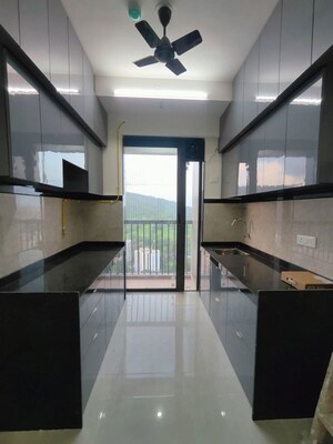Kitchen in 2 BHK Apartment at Damji Shamji Mahavir Spring Tulip Phase 1, Pokhran Road No Two – for Rent