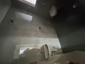 Bathroom in 2 BHK Apartment at Krishna Shreeji Hills, Pushpak Nagar – for Rent
