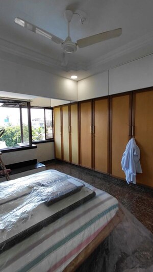 Bedroom in 2.5 BHK Apartment at Rizvi Complex Phase II , Bandra West – for Rent