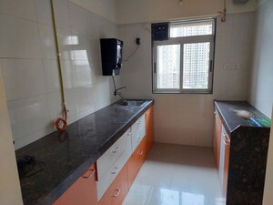 Kitchen in 2 BHK Apartment at Vihang Valley Phase 2, Kasarvadavali – for Rent