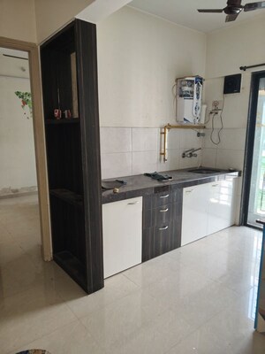 Kitchen in 2 BHK Apartment at Arsiwala Essar Apex, Virar West – for Rent