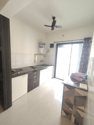 Kitchen in 2 BHK Apartment at Arsiwala Essar Apex, Virar West – for Rent