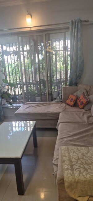 Hall in 2 BHK Apartment at Unnati Woods CHS, Kasarvadavali – for Rent
