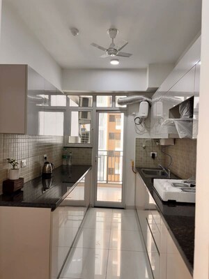 Kitchen in 4 BHK Apartment at Godrej Woods, Sector 43 – for Rent