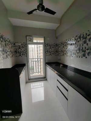 Kitchen in 1 BHK Apartment at Raunak Bliss, Ghodbunder Road – for Rent