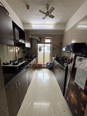 Kitchen in 2 BHK Apartment at Kanakia Rainforest, Andheri East – for Rent