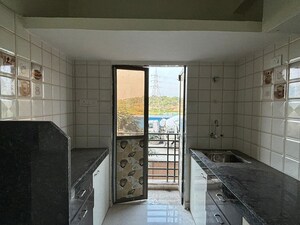 Kitchen in 1 BHK Apartment at Marvel Heights, Vasai East – for Sale
