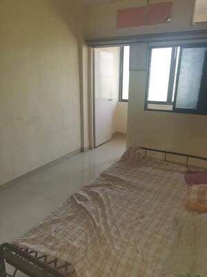 Room in 2 BHK Apartment at Shreenathji Tower, Kalyan West – for Sale