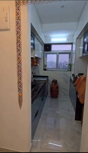 Kitchen in 1 BHK Apartment at Rajawadi – for Sale