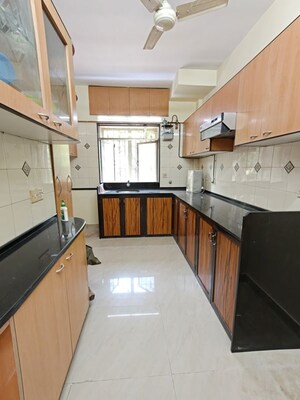 Kitchen in 2 BHK Apartment at Happy Valley, Manpada – for Rent