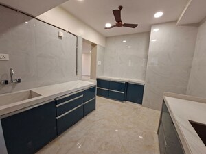 Kitchen in 3 BHK Apartment at Varun Garden, Ghodbunder Road – for Rent