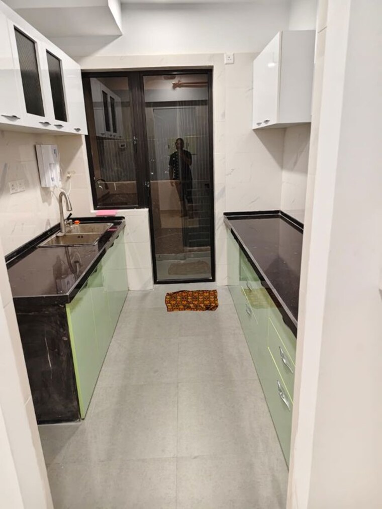 Kitchen, risland-the-icon 2 Bedroom 678 Sq.Ft. Apartment In Dhokali Thane 10663573