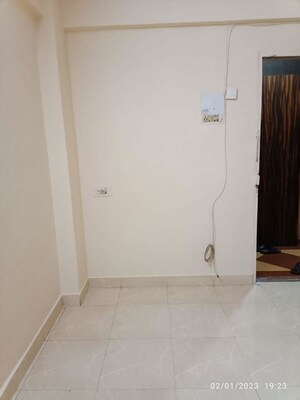 Living Room in 1 BHK Apartment at Ayodhya CHS Ghansoli, Ghansoli – for Sale