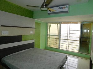 Master Bedroom in 2 BHK Apartment at Shanti Green Palms, Ghansoli – for Sale