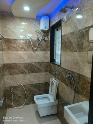 Bathroom in 2 BHK Apartment at Shanti Green Palms, Ghansoli – for Rent