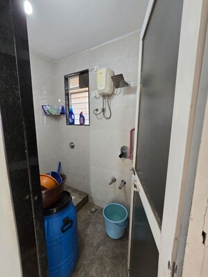 Bathroom in 3 BHK Apartment at Shanti Green Palms, Ghansoli – for Rent