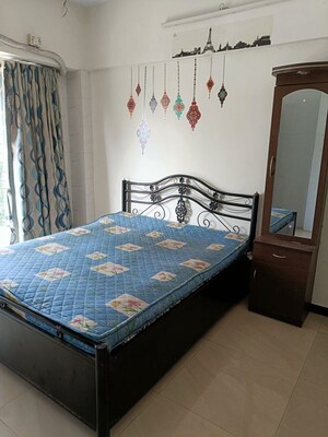 Bedroom in 2 BHK Apartment at Shanti Green Palms, Ghansoli – for Rent