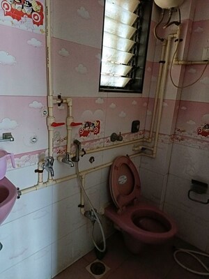 Bathroom in 2 BHK Apartment at Shanti Green Palms, Ghansoli – for Rent
