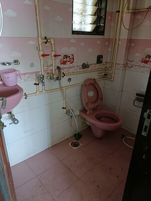 Bathroom in 2 BHK Apartment at Shanti Green Palms, Ghansoli – for Rent