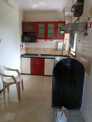 Kitchen in 2 BHK Apartment at Shanti Green Palms, Ghansoli – for Rent