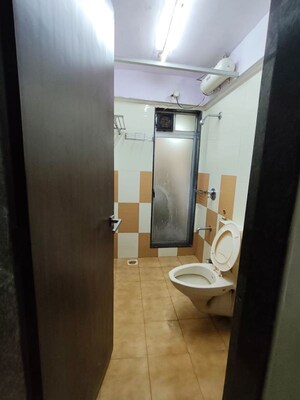 Bathroom in 2 BHK Apartment at Tilak Nagar Building, Tilak Nagar – for Rent