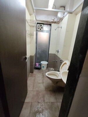 Bathroom in 2 BHK Apartment at Tilak Nagar Building, Tilak Nagar – for Rent
