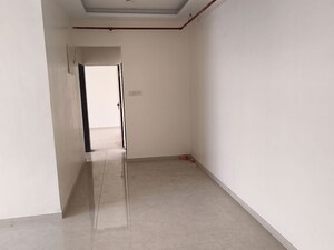 Room in 2 BHK Apartment at Kosmos Express Tower CHS, Borivali West – for Rent