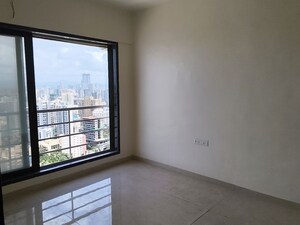 Room in 2 BHK Apartment at Kosmos Express Tower CHS, Borivali West – for Rent